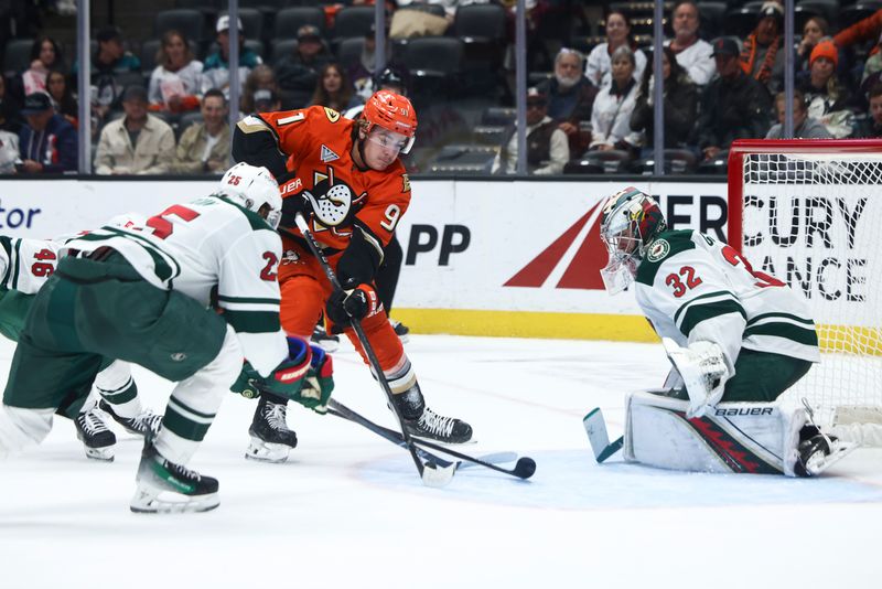 Nov 8, 2024; Anaheim, California, USA; Anaheim Ducks center Leo Carlsson (91) shoots during the second period against the Minnesota Wild at Honda Center. Mandatory Credit: Jessica Alcheh-Imagn Images