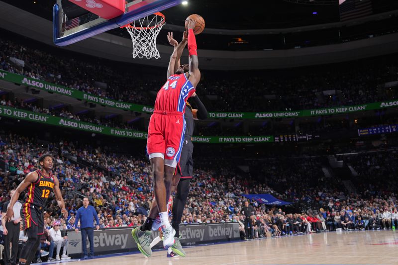 PHILADELPHIA, PA - FEBRUARY 9: Paul Reed #44 of the Philadelphia 76ers drives to the basket during the game against the Atlanta Hawks on February 9, 2024 at the Wells Fargo Center in Philadelphia, Pennsylvania NOTE TO USER: User expressly acknowledges and agrees that, by downloading and/or using this Photograph, user is consenting to the terms and conditions of the Getty Images License Agreement. Mandatory Copyright Notice: Copyright 2024 NBAE (Photo by Jesse D. Garrabrant/NBAE via Getty Images)