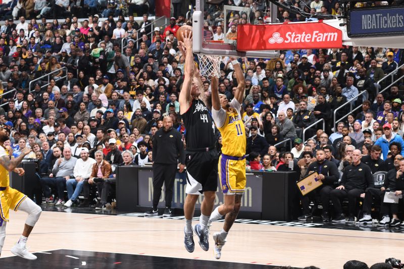 LOS ANGELES, CA - FEBRUARY 28: Mason Plumlee #44 of the LA Clippers dunks the ball during the game against the Los Angeles Lakers on February 28, 2024 at Crypto.Com Arena in Los Angeles, California. NOTE TO USER: User expressly acknowledges and agrees that, by downloading and/or using this Photograph, user is consenting to the terms and conditions of the Getty Images License Agreement. Mandatory Copyright Notice: Copyright 2024 NBAE (Photo by Andrew D. Bernstein/NBAE via Getty Images)