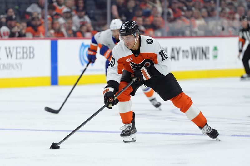 Oct 25, 2025; Philadelphia, Pennsylvania, USA; Philadelphia Flyers right wing Bobby Brink (10) controls the puck against the New York Islanders in the second period at Xfinity Mobile Arena. Mandatory Credit: Kyle Ross-Imagn Images