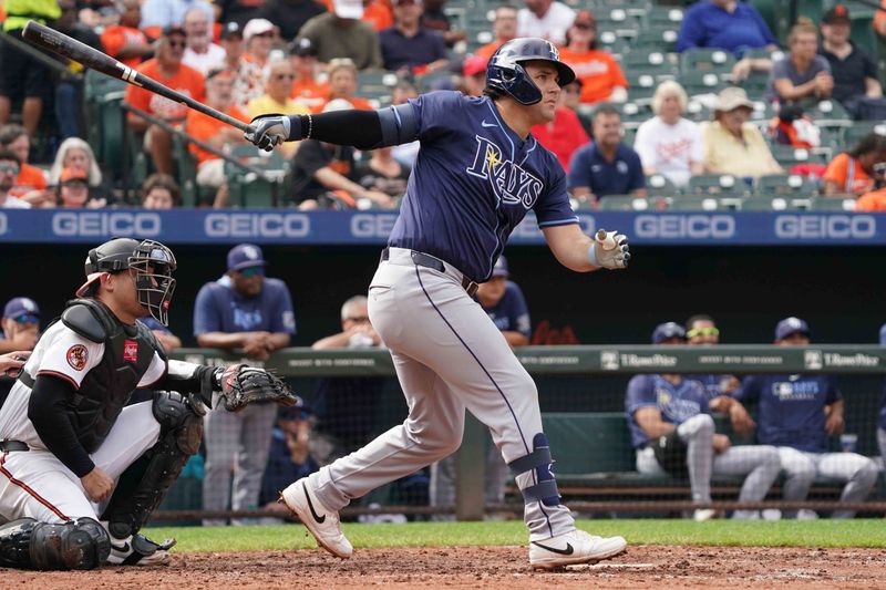 Sep 25, 2025; Baltimore, Maryland, USA; Tampa Bay Rays first baseman Bob Seymour (41) drives in a run during the sixth inning against the Baltimore Orioles at Oriole Park at Camden Yards. Mandatory Credit: Mitch Stringer-Imagn Images