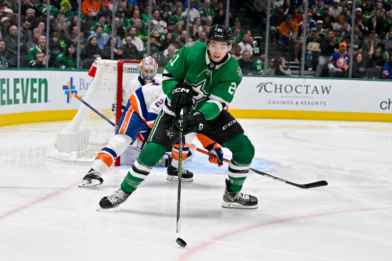 Feb 26, 2024; Dallas, Texas, USA; Dallas Stars left wing Jason Robertson (21) controls the puck in the New York Islanders zone during the second period at the American Airlines Center. Mandatory Credit: Jerome Miron-USA TODAY Sports