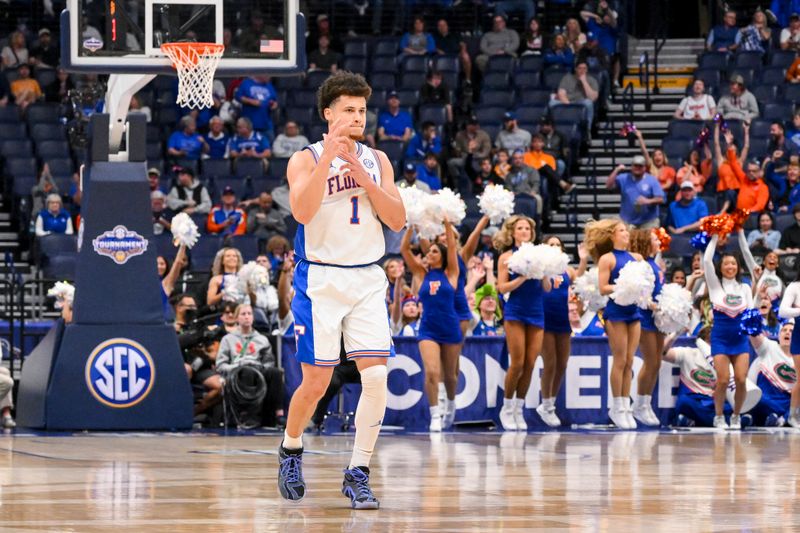 Mar 14, 2025; Nashville, TN, USA;  Florida Gators guard Walter Clayton Jr. (1) reacts after a made three point basket  against the Missouri Tigers during the first half at Bridgestone Arena. Mandatory Credit: Steve Roberts-Imagn Images