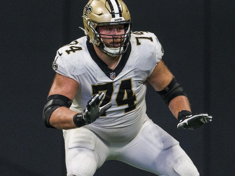 New Orleans Saints offensive tackle James Hurst (74) works during the first half of an NFL football game against the Atlanta Falcons, Sunday, Sep. 11, 2022, in Atlanta. The New Orleans Saints won 27-26. (AP Photo/Danny Karnik)