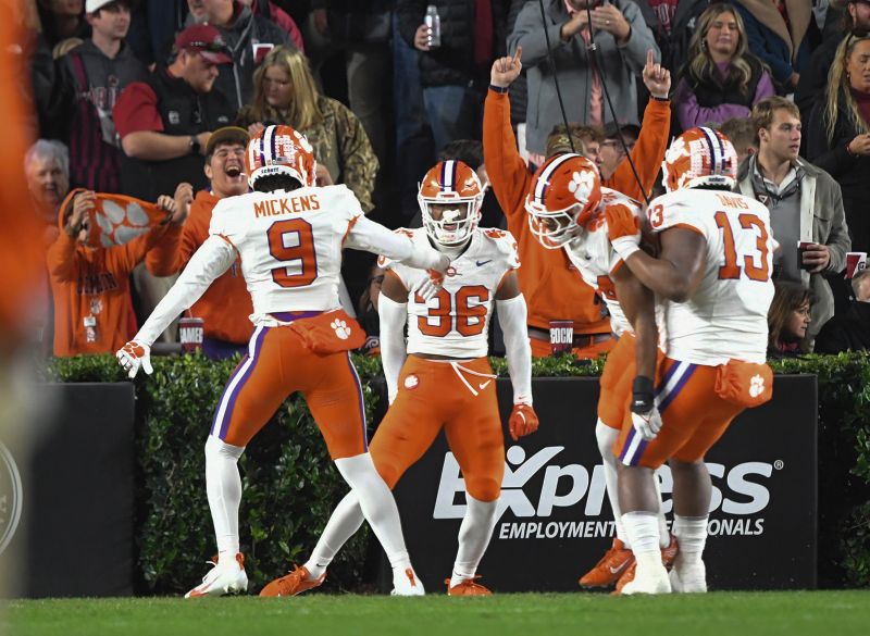 Nov 25, 2023; Columbia, South Carolina, USA; Clemson Tigers safety Khalil Barnes (36) celebrates with teammates after returning a loose ball against the South Carolina Gamecocks for a touchdown during the first quarter at Williams-Brice Stadium. Mandatory Credit: Ken Ruinard-USA TODAY Sports