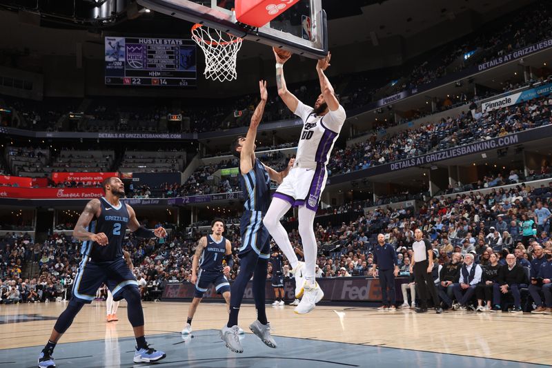 MEMPHIS, TN - JANUARY 29:  JaVale McGee #00 of the Sacramento Kings drives to the basket during the game against the Memphis Grizzlies on January 29, 2024 at FedExForum in Memphis, Tennessee. NOTE TO USER: User expressly acknowledges and agrees that, by downloading and or using this photograph, User is consenting to the terms and conditions of the Getty Images License Agreement. Mandatory Copyright Notice: Copyright 2024 NBAE (Photo by Joe Murphy/NBAE via Getty Images)