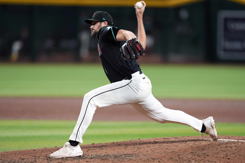 May 13, 2024; Phoenix, Arizona, USA; Arizona Diamondbacks pitcher Ryan Thompson (81) pitches against the Cincinnati Reds during the seventh inning at Chase Field. Mandatory Credit: Joe Camporeale-USA TODAY Sports