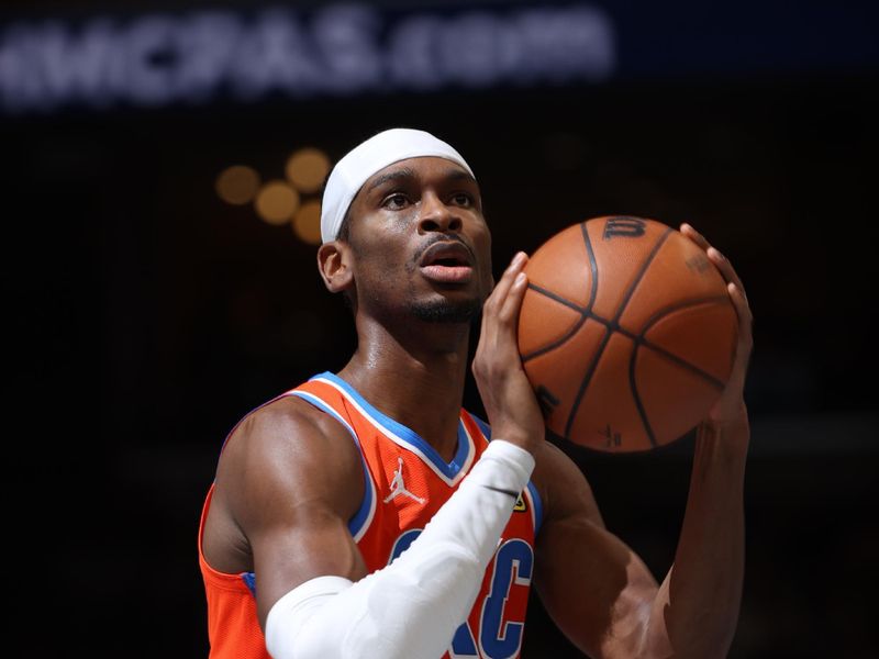 MEMPHIS, TN - MARCH 16:  Shai Gilgeous-Alexander #2 of the Oklahoma City Thunder shoots a free throw during the game against the Memphis Grizzlies on March 16, 2024 at FedExForum in Memphis, Tennessee. NOTE TO USER: User expressly acknowledges and agrees that, by downloading and or using this photograph, User is consenting to the terms and conditions of the Getty Images License Agreement. Mandatory Copyright Notice: Copyright 2024 NBAE (Photo by Joe Murphy/NBAE via Getty Images)