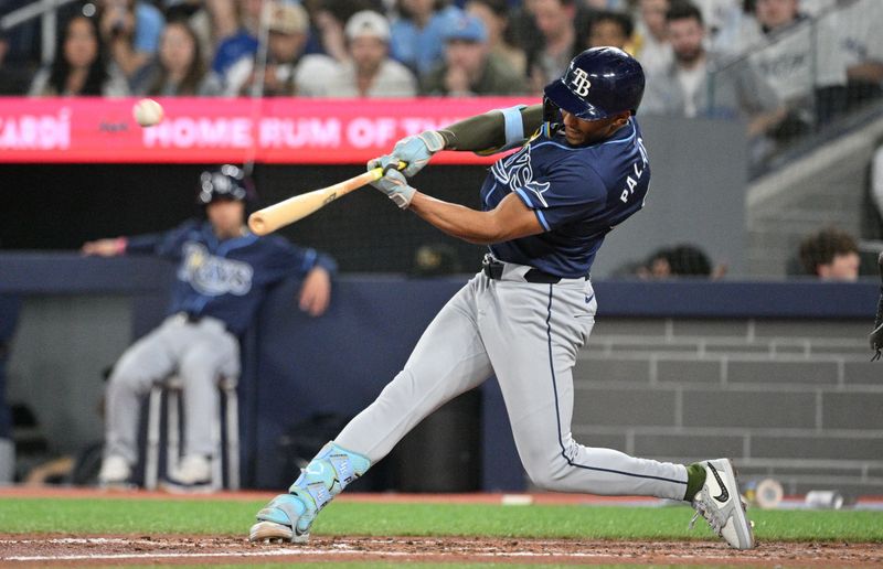 May 17, 2024; Toronto, Ontario, CAN;  Tampa Bay Rays second baseman Richie Palacios (10) hits a two run home run against the Toronto Blue Jays in the sixth inning at Rogers Centre. Mandatory Credit: Dan Hamilton-USA TODAY Sports