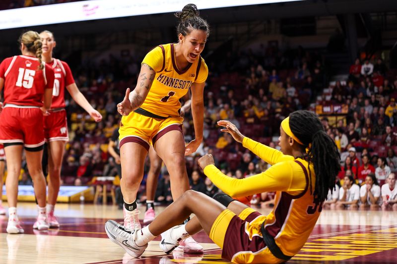 Feb 20, 2024; Minneapolis, Minnesota, USA; Minnesota Golden Gophers forward Ayianna Johnson (1) reacts after guard Janay Sanders (30) draws a foul during the first half against the Wisconsin Badgers at Williams Arena. Mandatory Credit: Matt Krohn-USA TODAY Sports