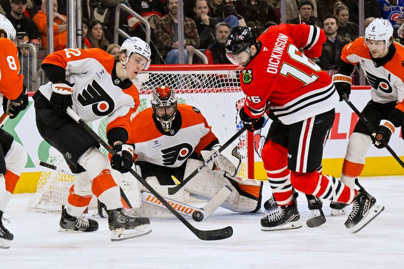Dec 23, 2025; Chicago, Illinois, USA; Philadelphia Flyers center Christian Dvorak (22) and Chicago Blackhawks center Jason Dickinson (16) chase the puck during the first period at United Center. Mandatory Credit: Matt Marton-Imagn Images Dec 23, 2025; Chicago, Illinois, USA; Philadelphia Flyers center Christian Dvorak (22) and Chicago Blackhawks center Jason Dickinson (16) chase the puck during the first period at United Center. Mandatory Credit: Matt Marton-Imagn Images