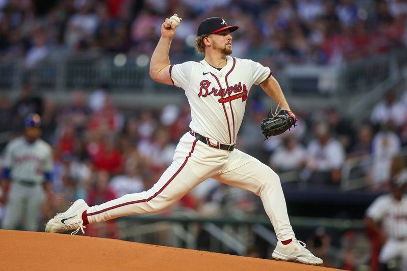 Sep 24, 2024; Atlanta, Georgia, USA; Atlanta Braves starting pitcher Spencer Schwellenbach (56) throws against the New York Mets in the first inning at Truist Park. Mandatory Credit: Brett Davis-Imagn Images
