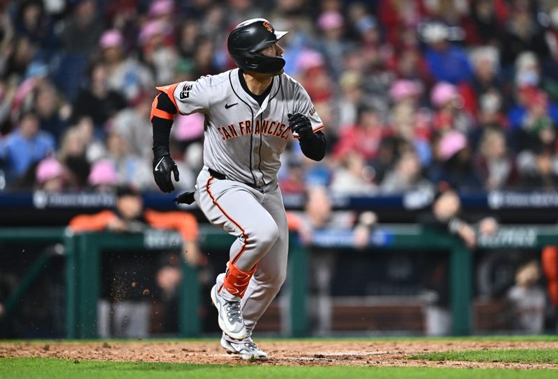 May 5, 2024; Philadelphia, Pennsylvania, USA; San Francisco Giants outfielder Michael Conforto (8) runs to first after hitting a triple against the Philadelphia Phillies in the eighth inning at Citizens Bank Park. Mandatory Credit: Kyle Ross-USA TODAY Sports