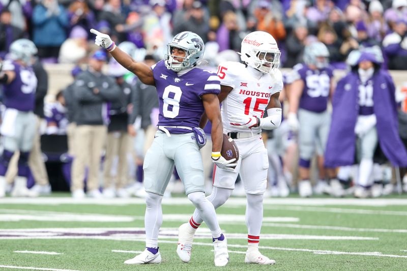 Oct 28, 2023; Manhattan, Kansas, USA; Kansas State Wildcats wide receiver Phillip Brooks (8) celebrates a catch during the second quarter against the Houston Cougars at Bill Snyder Family Football Stadium. Mandatory Credit: Scott Sewell-USA TODAY Sports