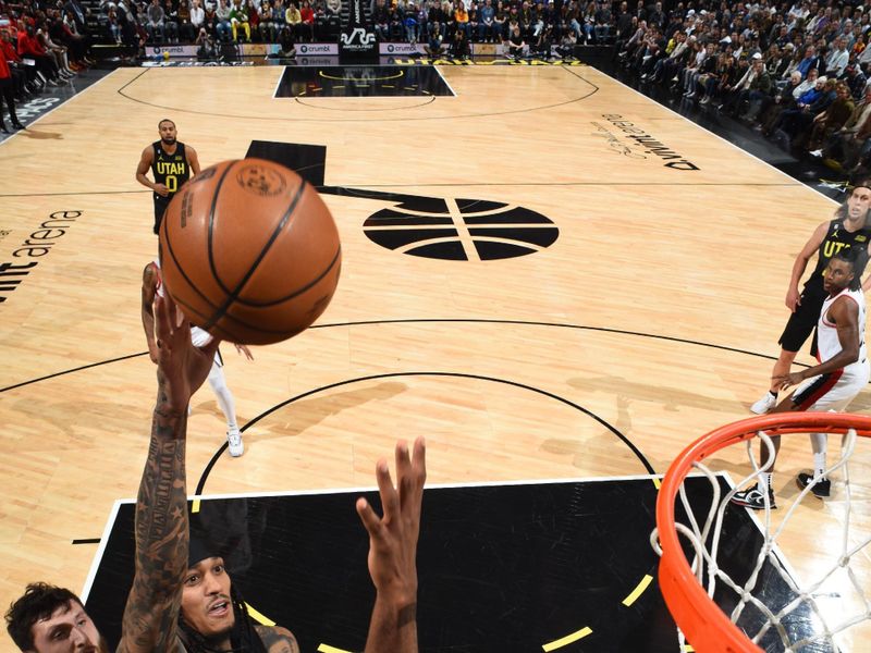 SALT LAKE CITY, UT - DECEMBER 3: Jordan Clarkson #00 of the Utah Jazz drives to the basket during the game against the Portland Trail Blazers on December 3, 2022 at vivint.SmartHome Arena in Salt Lake City, Utah. NOTE TO USER: User expressly acknowledges and agrees that, by downloading and or using this Photograph, User is consenting to the terms and conditions of the Getty Images License Agreement. Mandatory Copyright Notice: Copyright 2022 NBAE (Photo by Garrett Ellwood/NBAE via Getty Images)