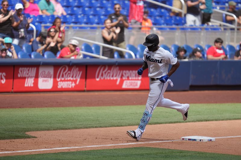 Apr 5, 2023; Miami, Florida, USA;  Miami Marlins left fielder Jorge Soler (12) rounds the bases after hitting a three-run home run against the Minnesota Twins in the eighth inning at loanDepot Park. Mandatory Credit: Jim Rassol-USA TODAY Sports