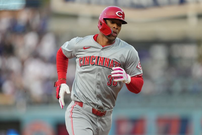 May 16, 2024; Los Angeles, California, USA; Cincinnati Reds center fielder Will Benson (30) runs the bases after hitting a home run in the first inning against the Los Angeles Dodgers at Dodger Stadium. Mandatory Credit: Kirby Lee-USA TODAY Sports