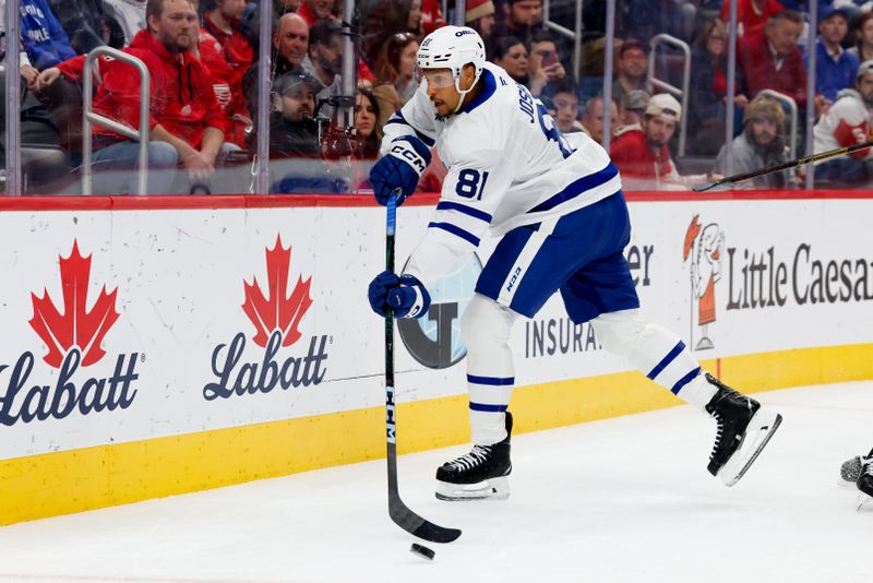Oct 11, 2025; Detroit, Michigan, USA;  Toronto Maple Leafs center Dakota Joshua (81) skates with the puck in the first period against the Detroit Red Wings at Little Caesars Arena. Mandatory Credit: Rick Osentoski-Imagn Images