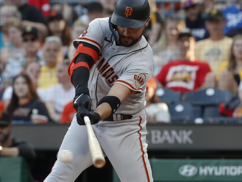 Jul 14, 2023; Pittsburgh, Pennsylvania, USA; San Francisco Giants right fielder Michael Conforto (8) hits a single against the Pittsburgh Pirates during the third inning at PNC Park. Mandatory Credit: Charles LeClaire-USA TODAY Sports