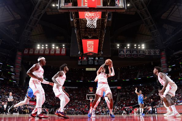 HOUSTON, TX - DECEMBER 6:   Jabari Smith Jr. #10 of the Houston Rockets rebounds the ball during the game against the Oklahoma City Thunder on December 6, 2023 at the Toyota Center in Houston, Texas. NOTE TO USER: User expressly acknowledges and agrees that, by downloading and or using this photograph, User is consenting to the terms and conditions of the Getty Images License Agreement. Mandatory Copyright Notice: Copyright 2023 NBAE (Photo by Michael Gonzales/NBAE via Getty Images)