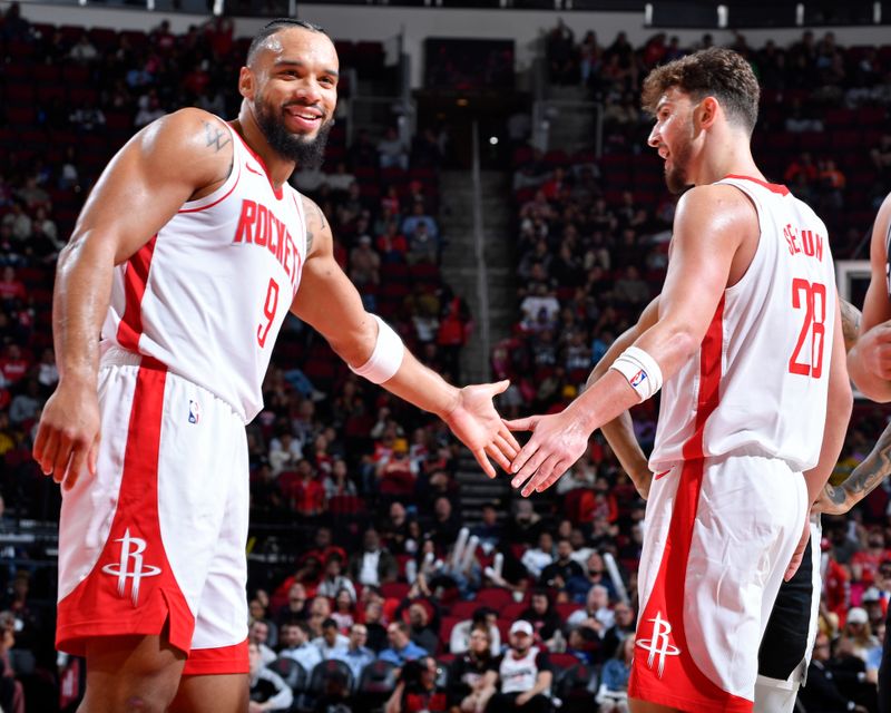 HOUSTON, TX - OCTOBER 17: Dillon Brooks #9 and Alperen Sengun #28 of the Houston Rockets high five during the game against the San Antonio Spurs on October 17, 2024 at the Toyota Center in Houston, Texas. NOTE TO USER: User expressly acknowledges and agrees that, by downloading and or using this photograph, User is consenting to the terms and conditions of the Getty Images License Agreement. Mandatory Copyright Notice: Copyright 2024 NBAE (Photo by Logan Riely/NBAE via Getty Images)