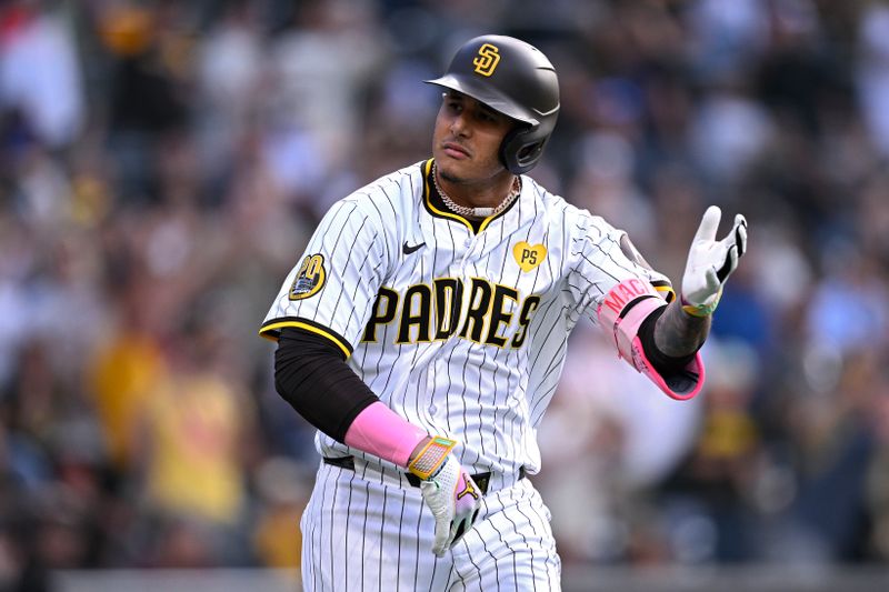 Jun 25, 2024; San Diego, California, USA; San Diego Padres third baseman Manny Machado (13) celebrates after hitting a two-run home run against the Washington Nationals during the first inning at Petco Park. Mandatory Credit: Orlando Ramirez-USA TODAY Sports