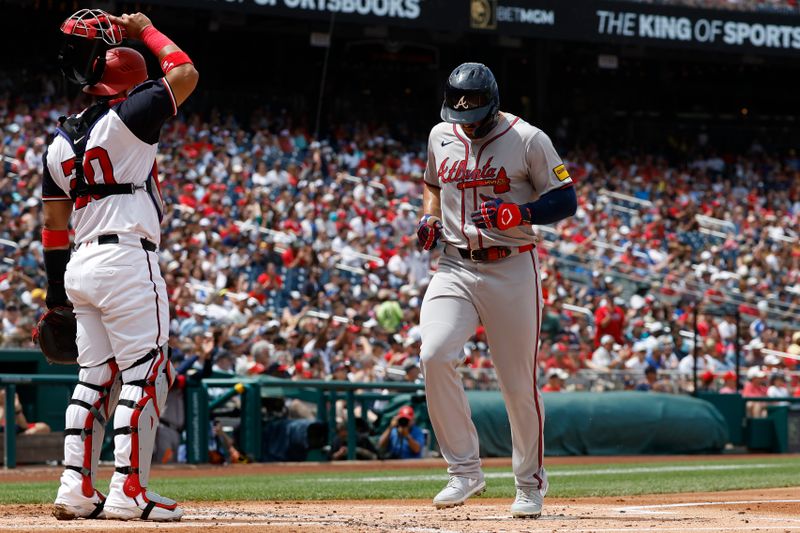 Jun 9, 2024; Washington, District of Columbia, USA; Atlanta Braves left fielder Adam Duvall (14) scores a run on an RBI single by Braves center fielder Michael Harris II (not pictured) against the Washington Nationals during the second inning at Nationals Park. Mandatory Credit: Geoff Burke-USA TODAY Sports