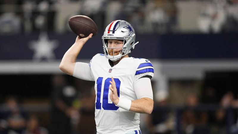 Dallas Cowboys quarterback Cooper Rush throws a pass during an NFL football game against the New York Giants in Arlington, Texas, Sunday, Nov. 12, 2023. (AP Photo/Tony Gutierrez)