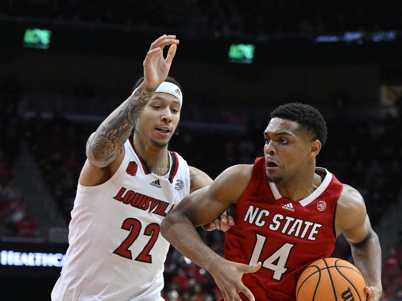 Jan 13, 2024; Louisville, Kentucky, USA;  North Carolina State Wolfpack guard Casey Morsell (14) drives to the basket against Louisville Cardinals guard Tre White (22) during the first half at KFC Yum! Center. Mandatory Credit: Jamie Rhodes-USA TODAY Sports