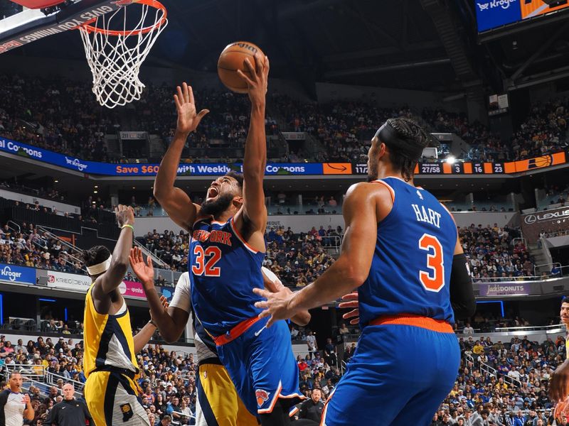 INDIANAPOLIS, IN - NOVEMBER 10: Karl-Anthony Towns #32 of the New York Knicks shoots the ball during the game against the Indiana Pacers during a regular season game on November 10, 2024 at Gainbridge Fieldhouse in Indianapolis, Indiana. NOTE TO USER: User expressly acknowledges and agrees that, by downloading and or using this Photograph, user is consenting to the terms and conditions of the Getty Images License Agreement. Mandatory Copyright Notice: Copyright 2024 NBAE (Photo by Ron Hoskins/NBAE via Getty Images)