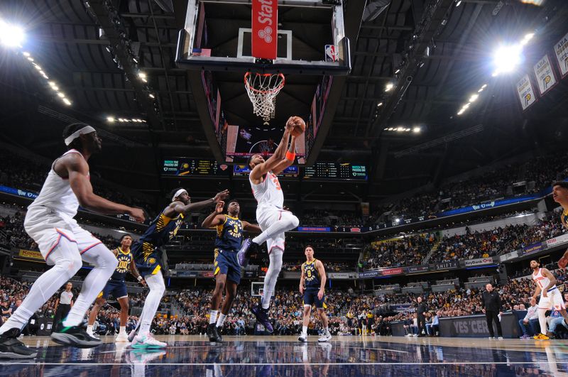 INDIANAPOLIS, IN - FEBRUARY 11:  Karl-Anthony Towns #32 of the New York Knicks drives to the basket during the game against the Indiana Pacers on February 11, 2025 at Gainbridge Fieldhouse in Indianapolis, Indiana. NOTE TO USER: User expressly acknowledges and agrees that, by downloading and or using this Photograph, user is consenting to the terms and conditions of the Getty Images License Agreement. Mandatory Copyright Notice: Copyright 2025 NBAE (Photo by Ron Hoskins/NBAE via Getty Images)