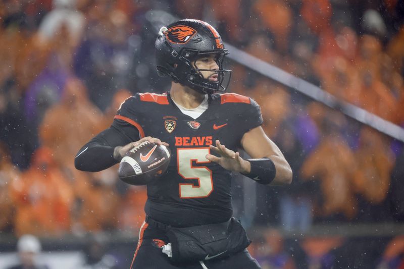 Nov 18, 2023; Corvallis, Oregon, USA; Oregon State Beavers quarterback DJ Uiagalelei (5) looks to throw during the second half against the Washington Huskies  at Reser Stadium. Mandatory Credit: Soobum Im-USA TODAY Sports