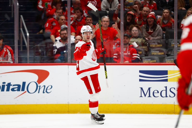 Mar 26, 2024; Washington, District of Columbia, USA; Detroit Red Wings right wing Alex DeBrincat (93) celebrates after scoring a goal against the Washington Capitals during the second period at Capital One Arena. Mandatory Credit: Amber Searls-USA TODAY Sports