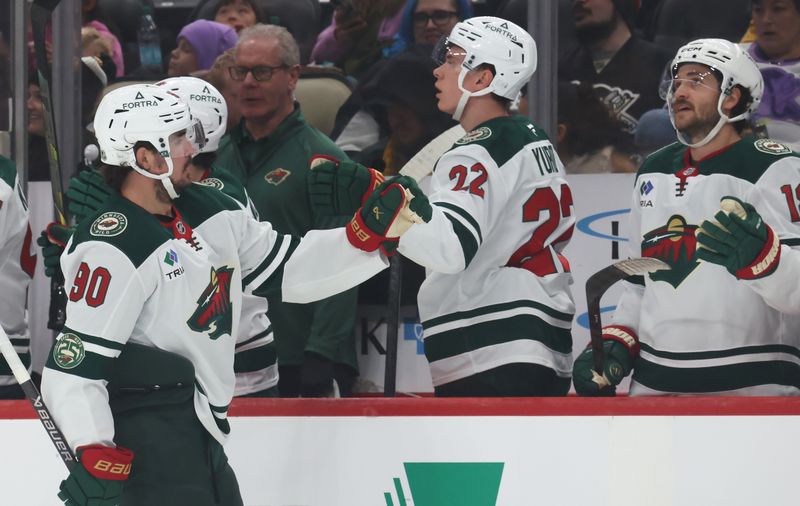 Nov 21, 2025; Pittsburgh, Pennsylvania, USA;  Minnesota Wild left wing Marcus Johansson (90) celebrates his goal with the Wild bench against the Pittsburgh Penguins during the first period at PPG Paints Arena. Mandatory Credit: Charles LeClaire-Imagn Images