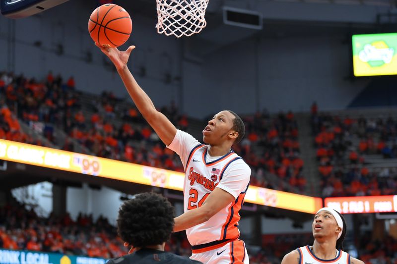 Jan 20, 2024; Syracuse, New York, USA; Syracuse Orange guard Quadir Copeland (24) shoots the ball against the Miami (Fl) Hurricanes during the second half at the JMA Wireless Dome. Mandatory Credit: Rich Barnes-USA TODAY Sports