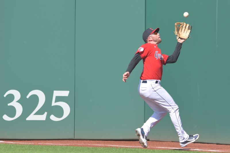 Jun 24, 2023; Cleveland, Ohio, USA; Cleveland Guardians right fielder David Fry (12) catches a ball hit by Milwaukee Brewers center fielder Joey Wiemer (not pictured) during the third inning at Progressive Field. Mandatory Credit: Ken Blaze-USA TODAY Sports