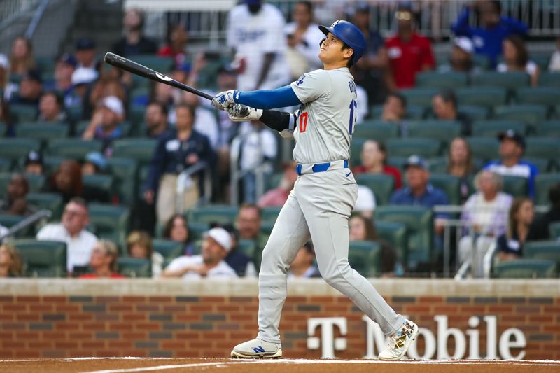 Sep 13, 2024; Atlanta, Georgia, USA; Los Angeles Dodgers designated hitter Shohei Ohtani (17) bats against the Atlanta Braves in the first inning at Truist Park. Mandatory Credit: Brett Davis-Imagn Images