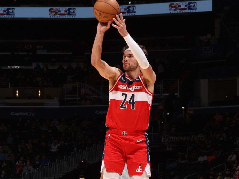 WASHINGTON, DC -? MARCH 6:  Corey Kispert #24 of the Washington Wizards shoots a 3-point basket during the game  on March 6, 2024 at Capital One Arena in Washington, DC. NOTE TO USER: User expressly acknowledges and agrees that, by downloading and or using this Photograph, user is consenting to the terms and conditions of the Getty Images License Agreement. Mandatory Copyright Notice: Copyright 2024 NBAE (Photo by Stephen Gosling/NBAE via Getty Images)