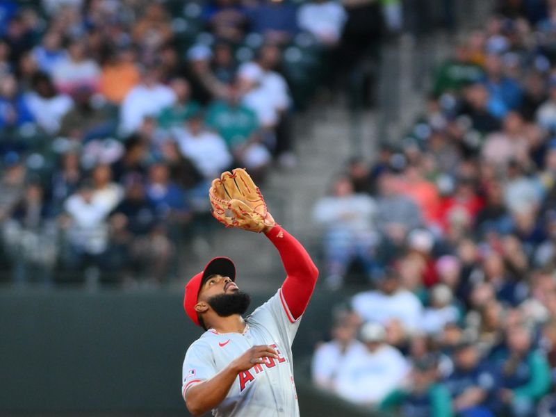May 31, 2024; Seattle, Washington, USA; Los Angeles Angels second baseman Luis Rengifo (2) catches a fly ball during the fifth inning against the Seattle Mariners at T-Mobile Park. Mandatory Credit: Steven Bisig-USA TODAY Sports