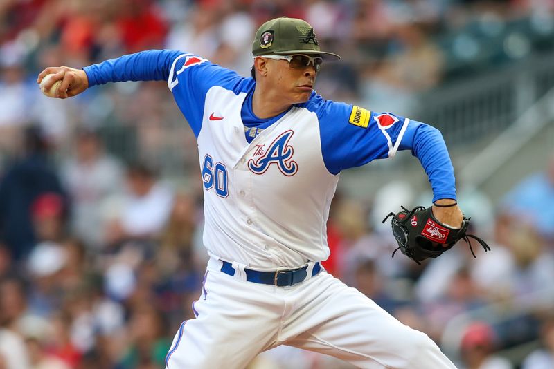 May 20, 2023; Atlanta, Georgia, USA; Atlanta Braves starting pitcher Jesse Chavez (60) throws against the Seattle Mariners in the first inning at Truist Park. Mandatory Credit: Brett Davis-USA TODAY Sports
