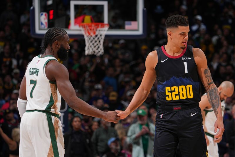 DENVER, CO - MARCH 7: Michael Porter Jr. #1 of the Denver Nuggets high fives Jaylen Brown #7 of the Boston Celtics during the game on March 7, 2024 at the Ball Arena in Denver, Colorado. NOTE TO USER: User expressly acknowledges and agrees that, by downloading and/or using this Photograph, user is consenting to the terms and conditions of the Getty Images License Agreement. Mandatory Copyright Notice: Copyright 2024 NBAE (Photo by Bart Young/NBAE via Getty Images)