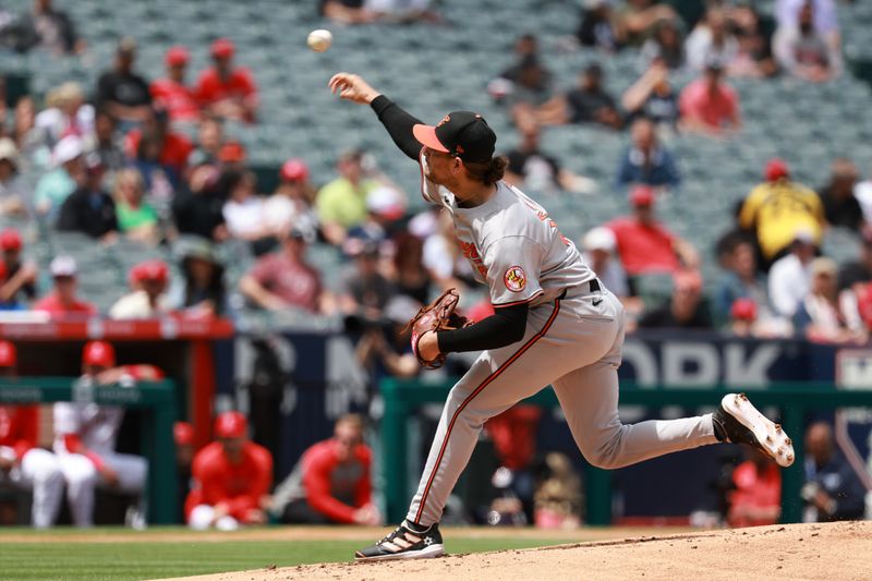 Apr 24, 2024; Anaheim, California, USA;  Baltimore Orioles pitcher Dean Kremer (64) pitches during the first inning against the Los Angeles Angels at Angel Stadium. Mandatory Credit: Kiyoshi Mio-USA TODAY Sports