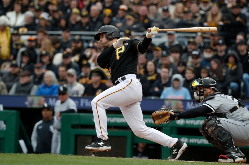 Apr 7, 2023; Pittsburgh, Pennsylvania, USA;  Pittsburgh Pirates catcher Jason Delay (55) hits a single against the Chicago White Sox during the fourth inning at PNC Park. Mandatory Credit: Charles LeClaire-USA TODAY Sports