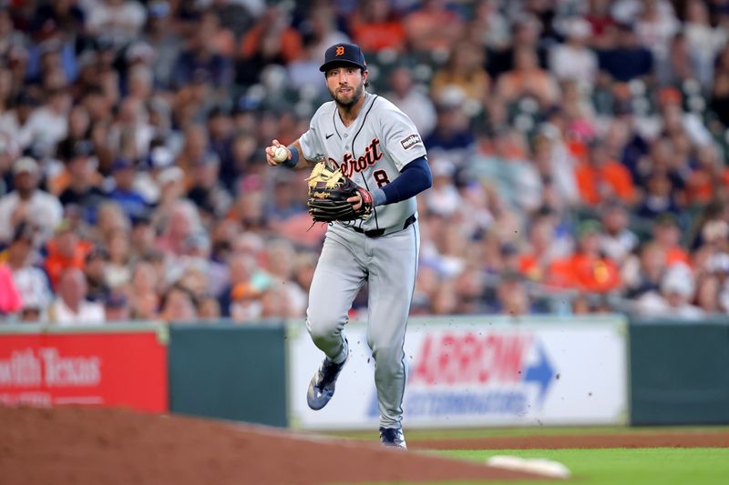 Jun 15, 2024; Houston, Texas, USA; Detroit Tigers third baseman Matt Vierling (8) throws a fielded ball to first base for an out against the Houston Astros during the fourth inning at Minute Maid Park. Mandatory Credit: Erik Williams-USA TODAY Sports
