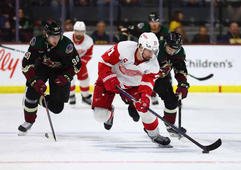 Jan 17, 2023; Tempe, Arizona, USA; Detroit Red Wings center Dylan Larkin (71) moves the puck against the Arizona Coyotes in the third period at Mullett Arena. Mandatory Credit: Mark J. Rebilas-USA TODAY Sports