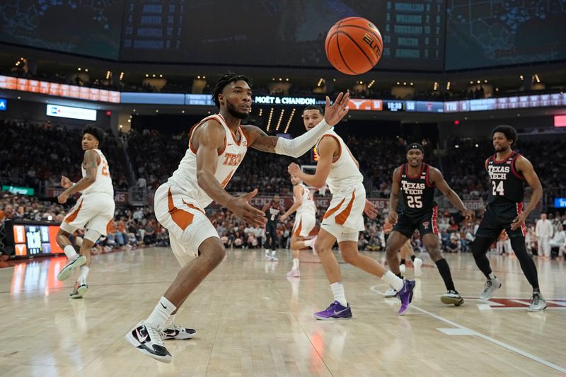 Jan 6, 2024; Austin, Texas, USA; Texas Longhorns guard Tyrese Hunter (4) goes after a loose ball during the second half against the Texas Tech Red Raiders at Moody Center. Mandatory Credit: Scott Wachter-USA TODAY Sports