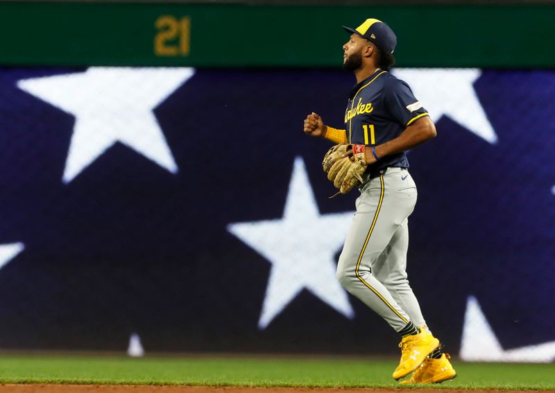 Sep 24, 2024; Pittsburgh, Pennsylvania, USA;  Milwaukee Brewers outfielder Jackson Chourio (11) takes his position in left field against he Pittsburgh Pirates during the third inning at PNC Park. Mandatory Credit: Charles LeClaire-Imagn Images