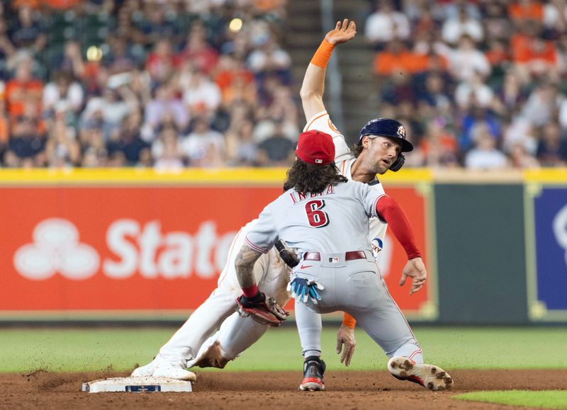 Jun 17, 2023; Houston, Texas, USA; Cincinnati Reds second baseman Jonathan India (6) tags out Houston Astros first baseman Grae Kessinger (16) on a stolen base attempt at second base in the fifth inning at Minute Maid Park. Mandatory Credit: Thomas Shea-USA TODAY Sports