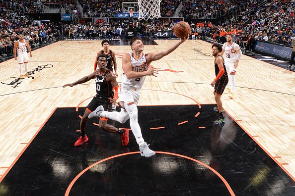 DETROIT, MI - NOVEMBER 5: Grayson Allen #8 of the Phoenix Suns shoots the ball during the game against the Detroit Pistons on November 5, 2023 at Little Caesars Arena in Detroit, Michigan. NOTE TO USER: User expressly acknowledges and agrees that, by downloading and/or using this photograph, User is consenting to the terms and conditions of the Getty Images License Agreement. Mandatory Copyright Notice: Copyright 2023 NBAE (Photo by Chris Schwegler/NBAE via Getty Images)