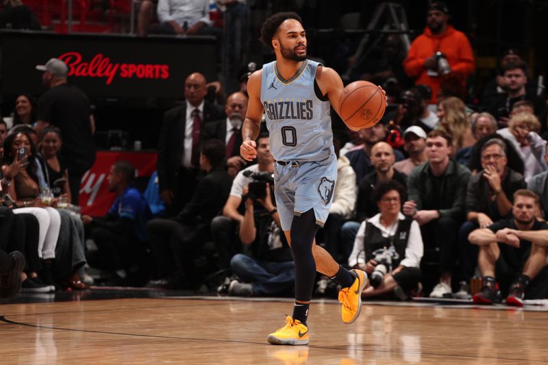 MIAMI, FL - JANUARY 24:  Jacob Gilyard #0 of the Memphis Grizzlies handles the ball during the game against the Miami Heat on January 24, 2024 at Kaseya Center in Miami, Florida. NOTE TO USER: User expressly acknowledges and agrees that, by downloading and or using this Photograph, user is consenting to the terms and conditions of the Getty Images License Agreement. Mandatory Copyright Notice: Copyright 2024 NBAE (Photo by Issac Baldizon/NBAE via Getty Images)